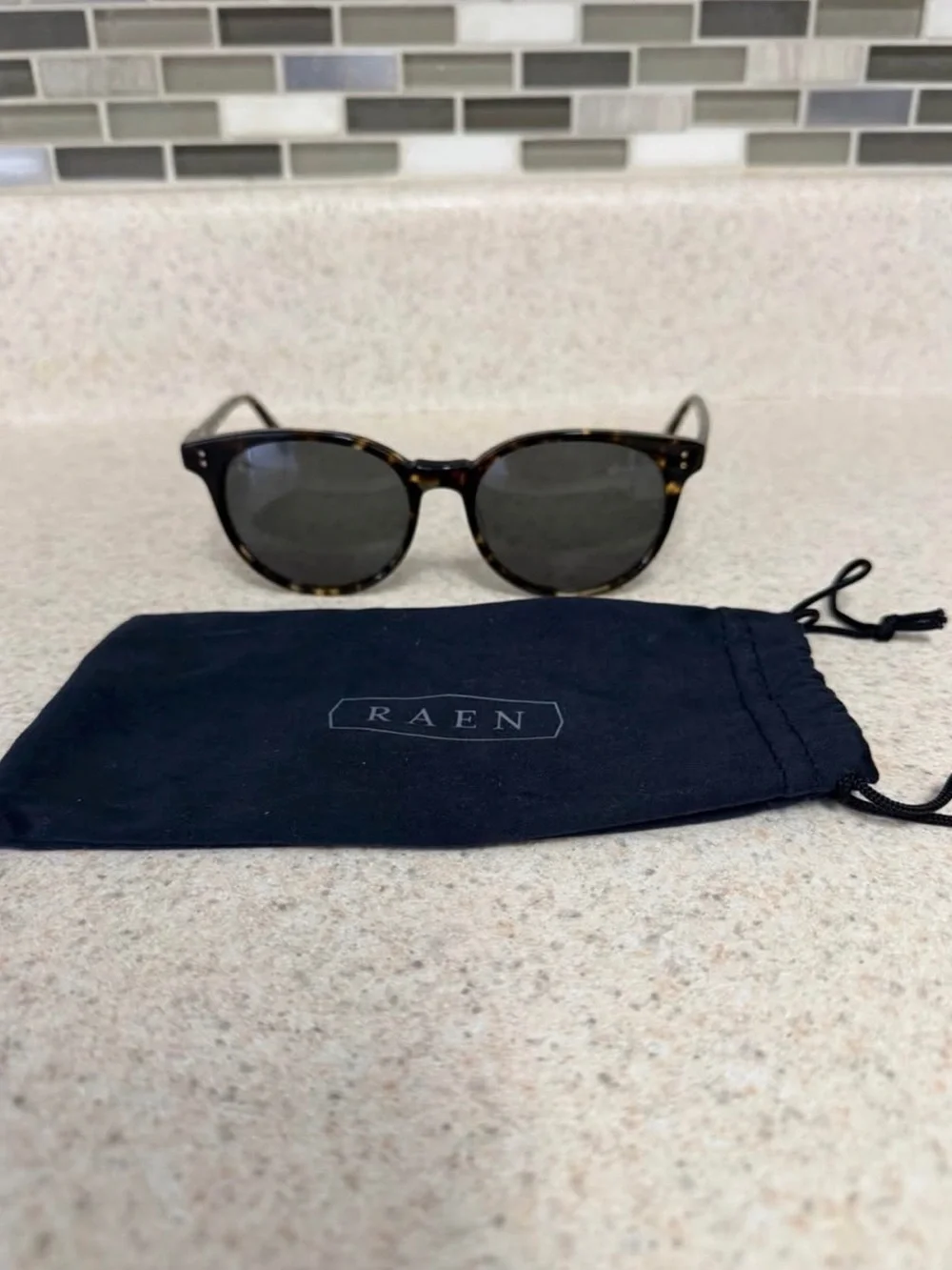 RAEN Tortoiseshell Round Sunglasses with Dark Lenses
